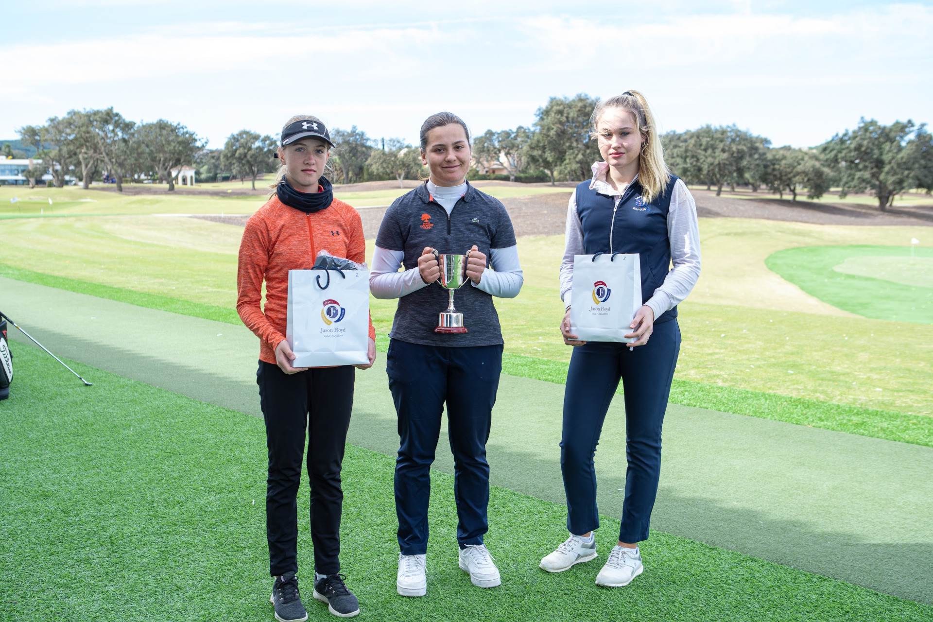 Triple A World Junior Golf Series - winners of the Triple A European Classic, Juliette Demeaux, Barbora Vinkler and Hannah Guerin at The San Roque Club, Old Course.